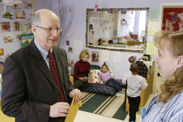 Dick Clifford talking with a classroom teacher