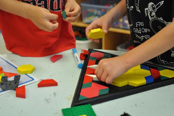 Children doing puzzle