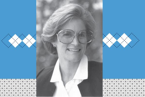 black and white headshot of Sharon Landesman with Carolina blue background and small argyle shapes in the background