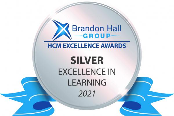 brandon hall group HCM excellence awards, SILVER excellence in learning 2021; silver and blue award emblem