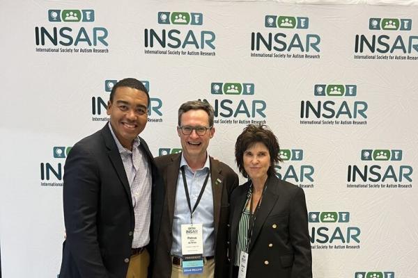 3 colleagues attend the INSAR conference; Brian Boyd pictured at far left