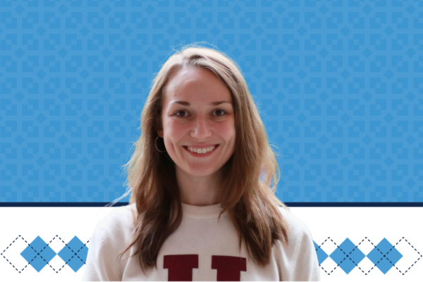 Headshot of Mary Carmen Edwards with Carolina blue pattern background and Carolina blue argyle along bottom