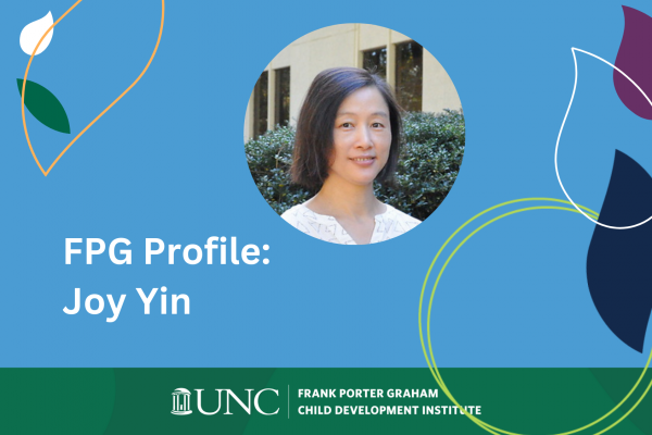 FPG Profile: Joy Yin; round photo frame with head shot of Joy Yin on carolina blue background with decorative leaves