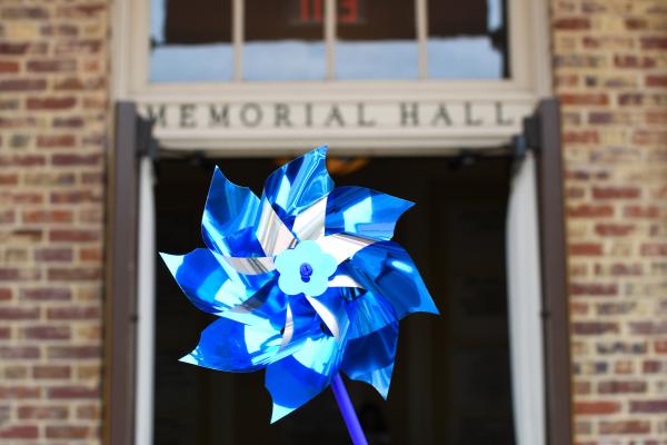 pinwheel in front of Memorial Hall