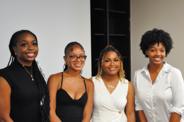2025 MSP Scholar cohort; four young women stand smiling at camera