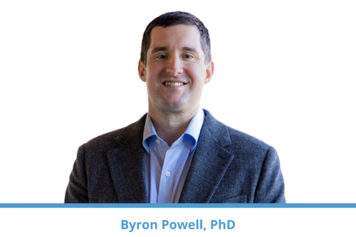 byron powell; man with short dark hair blue shirt and gray jacket