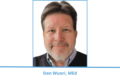 dan wuouri; man with short dark hair, graying beard and goatee smiles camera