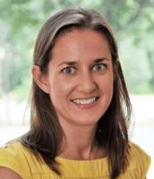Rebecca Dees; woman with shoulder-length brown hair and wearing a yellow top smiles at camera